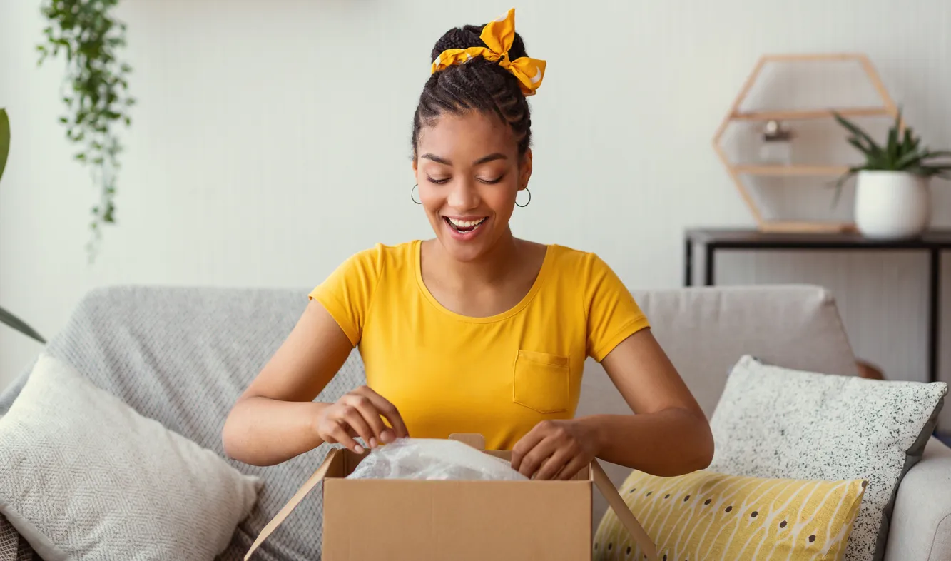 Woman opening package